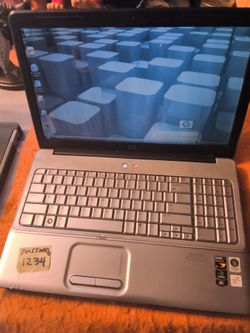 Older HP G660 laptop computer Look at pictures for full description.