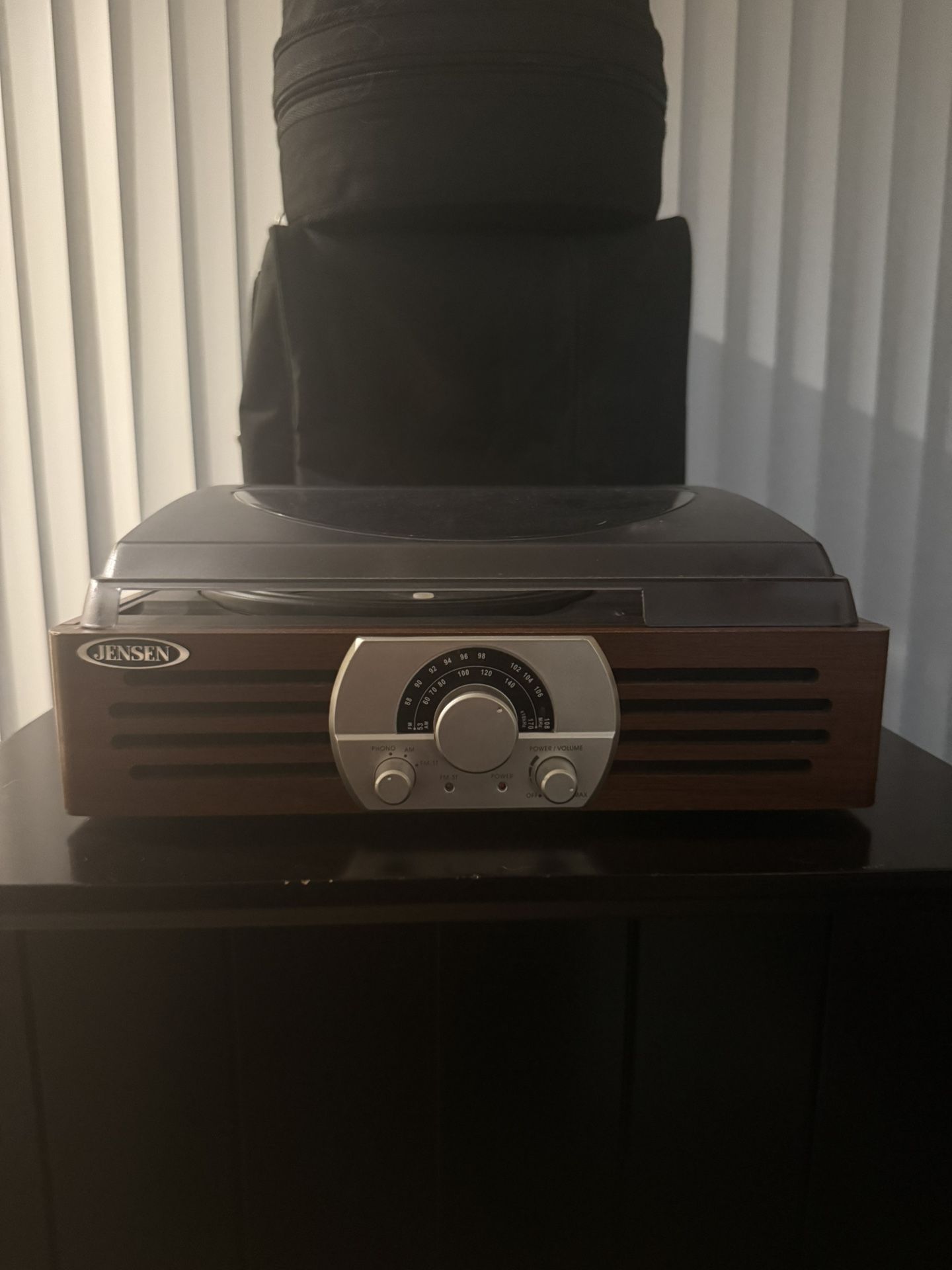 Retro-style Jensen turntable with radio and built-in speakers