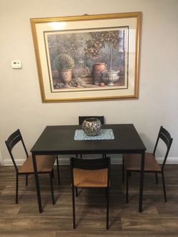 Like new black dining table set with 4 chairs