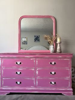 Furniture used dresser. Restored dresser with a mirror in vintage style..