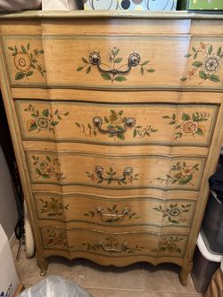 Beautiful Real wood dresser with five drawers.