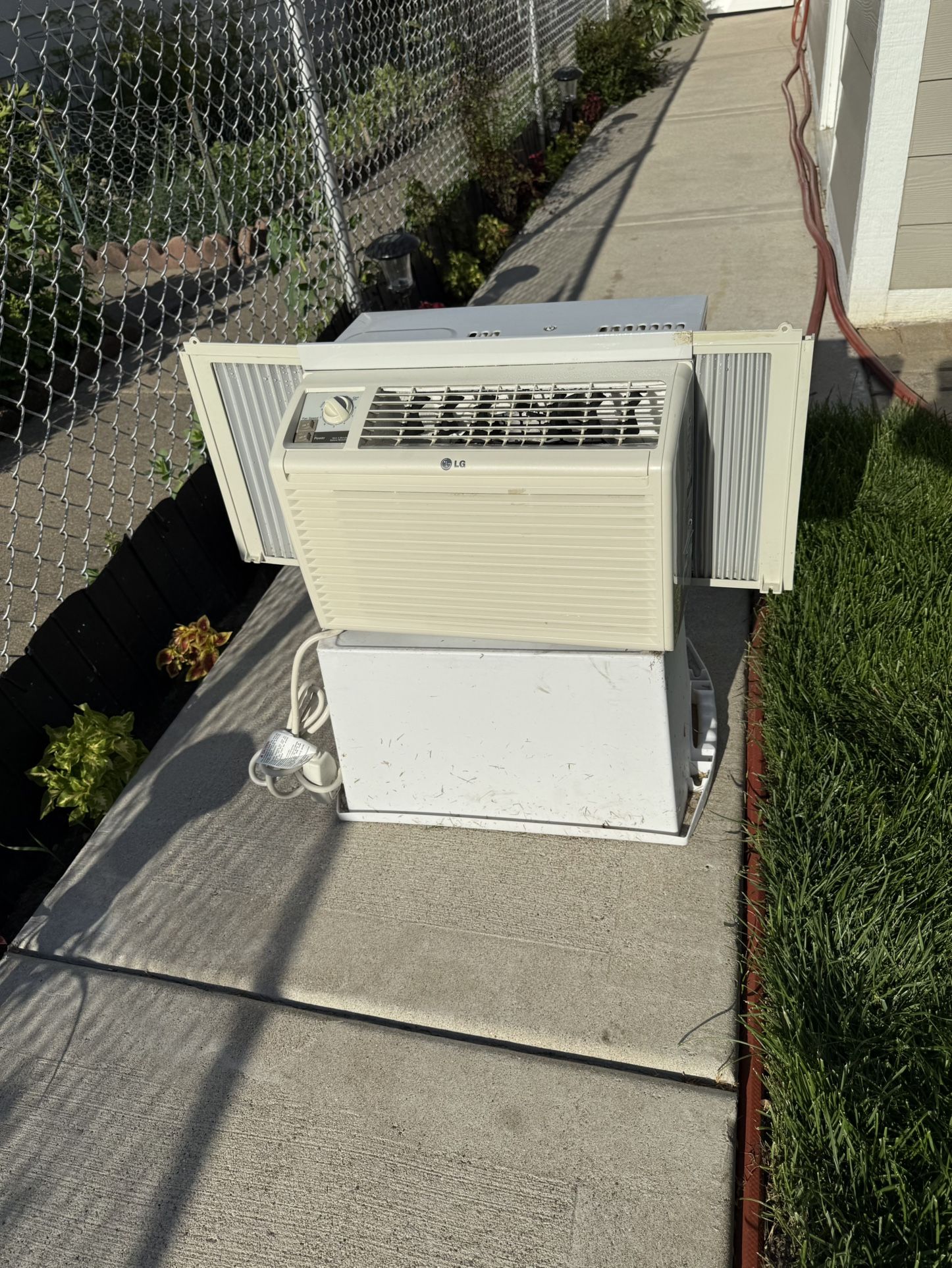G.E. AIR CONDITIONER $70.00 OR BEST OFFER.
