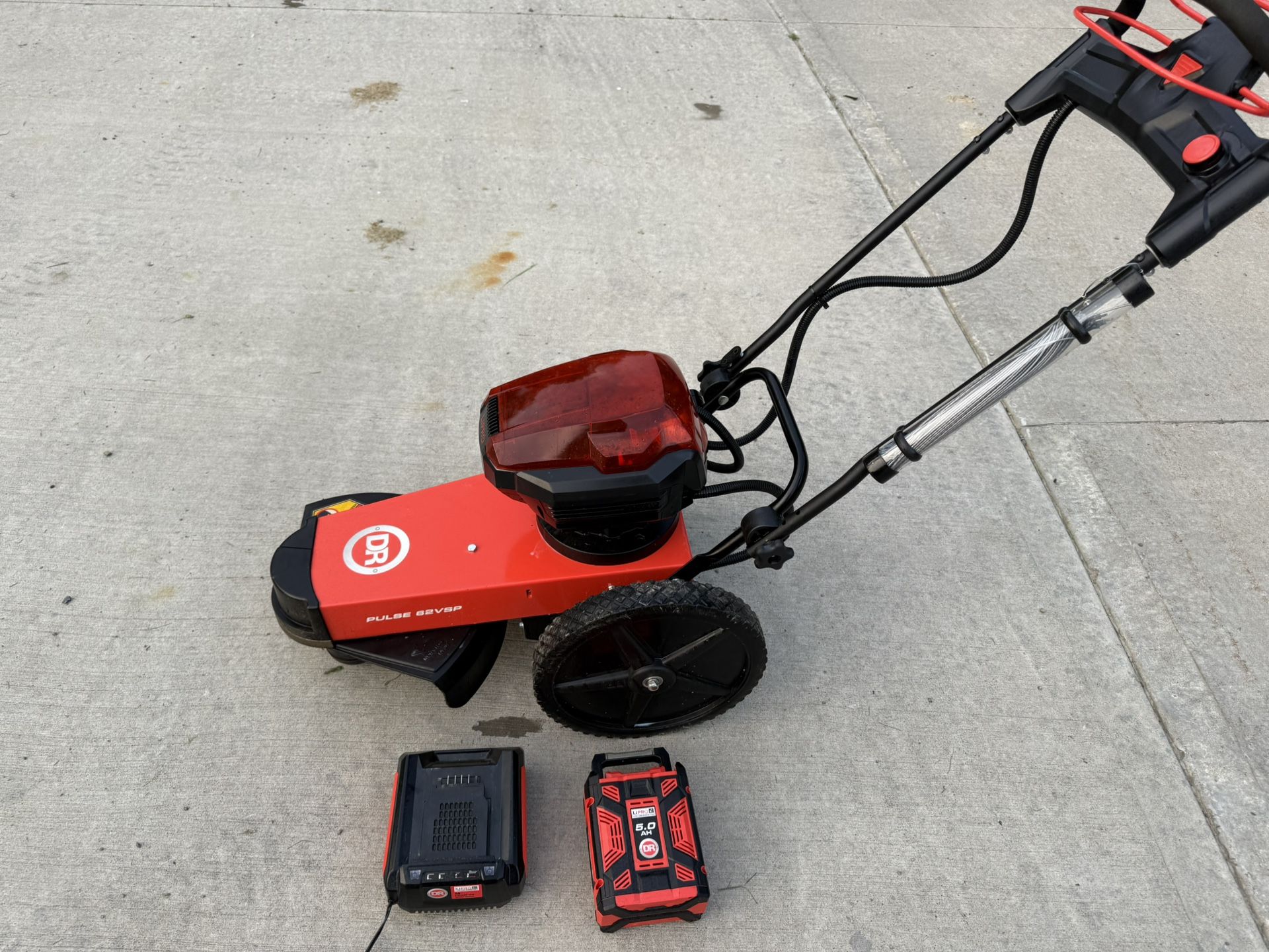 LIKE NEW DR TRIMMER PULSE 62VSP 62V BATTERY TRIMMER MOWER ONLY $600 RETAILS $1110