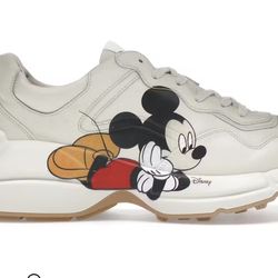 Gucci Sneakers – Pre-owned 	•	Authentic Gucci sneakers with Mickey Mouse design 	•	Color: White 	•	Condition: Pre-owned (still in good condition) 	•	S
