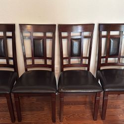4 Wooden Brown Chairs 
