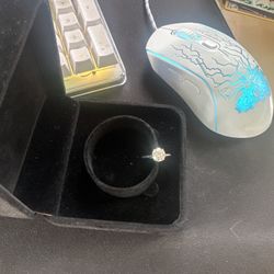 Beautiful 14K gold ring with a large round center stone (approx. 2 carat look). Ring is stamped 14KT on the inside, confirming real gold.