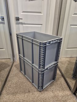 Grey solid plastic containers with lids