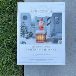 INFLATABLE SANTA IN CHIMNEY 