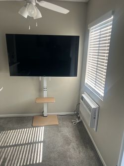 White Floor TV Stand with Power Outlet – Like New