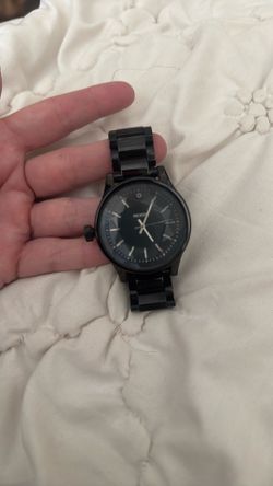 Black metal women’s Nixon Watch