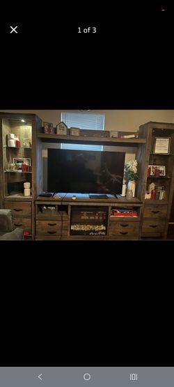 Rustic Wood Entertainment Center with Fireplace