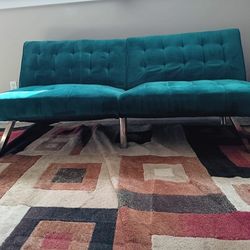 Green velvet futon