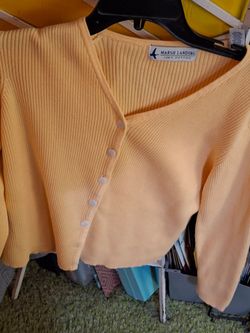 A pair of Cargo pants 👖 and a sweater both brand new! Both for $10
