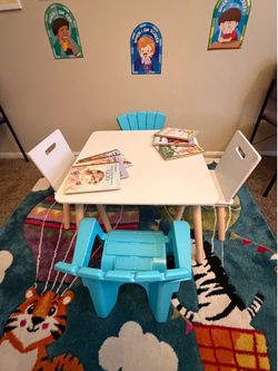 Child table and chairs and designer rug, play yard, etc.