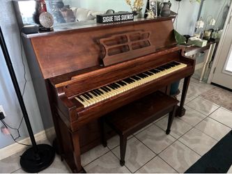 Vintage wood piano for sale