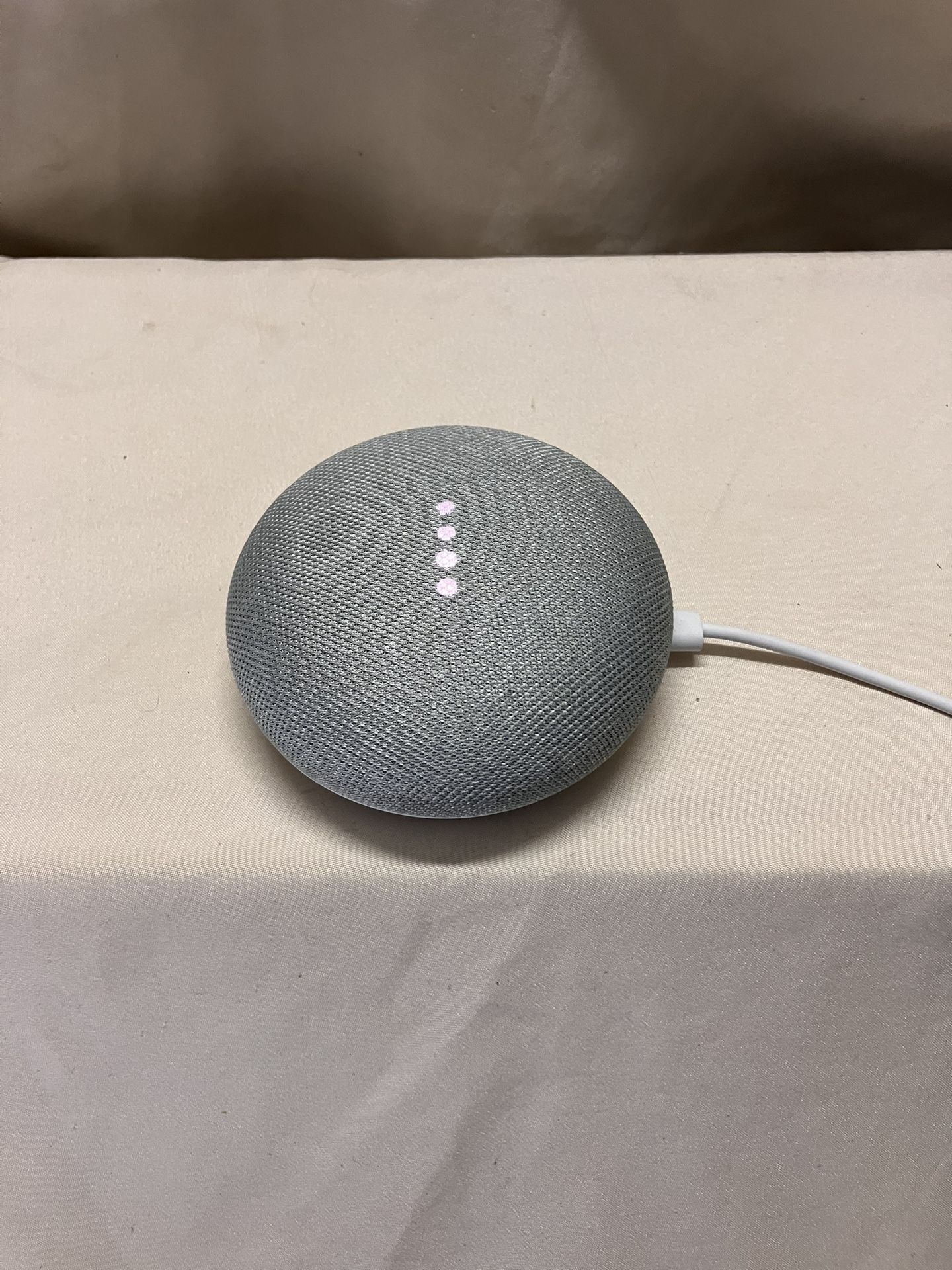 Google Home Mini Chalk Gray and White speaker