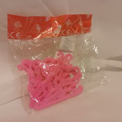 NEW barbie & doll clothes pink hangers
