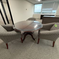 Round Conference Table + 3 Upholstered Chairs – $200 