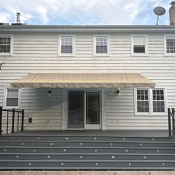 Motorized 17’ SunSetter Awning w/ Remote – Beige Canvas