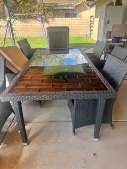 Patio table with 6 chairs and seat cushions
