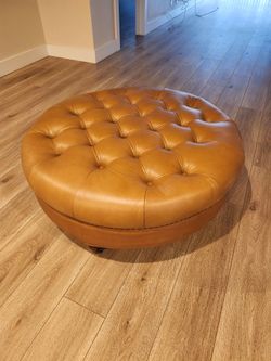 Leather tufted ottoman