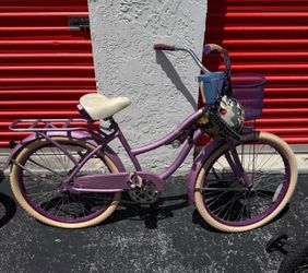 Woman bike beach