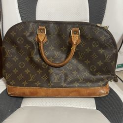 Louis Vuitton Alma Handbag 