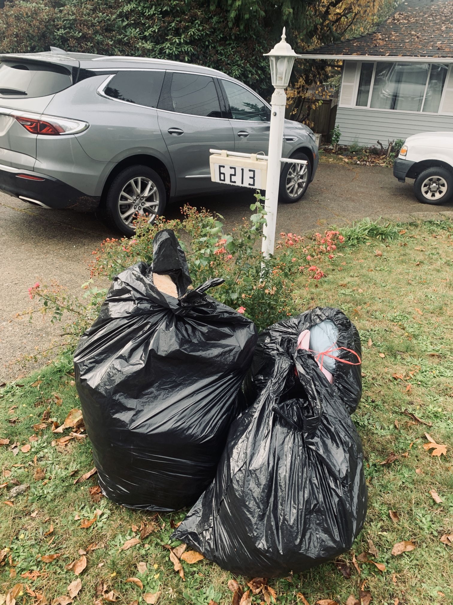 Three large bags of clothing, assorted sizes