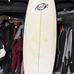 5’11” surfboard by tim stamps