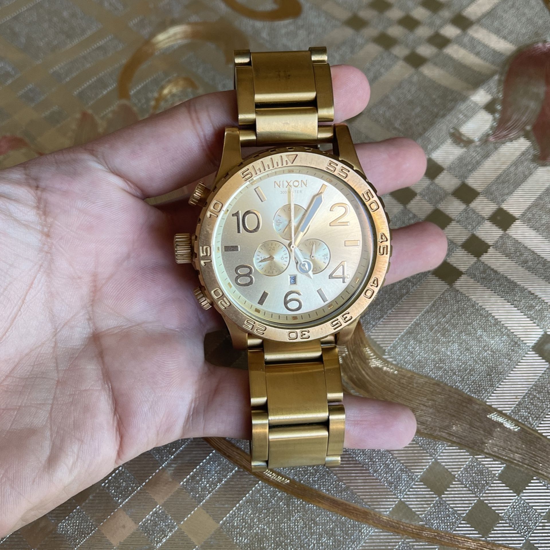 Gold Nixon Watch