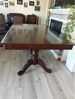 Dining table set in dark wood