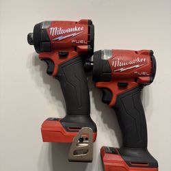 2 used- Milwaukee M18 FUEL 18V Lithium-lon Brushless Cordless 1/4 in. Hex Impact Driver (Tool-Only)