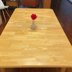 Wooden kitchen table with detachable legs
