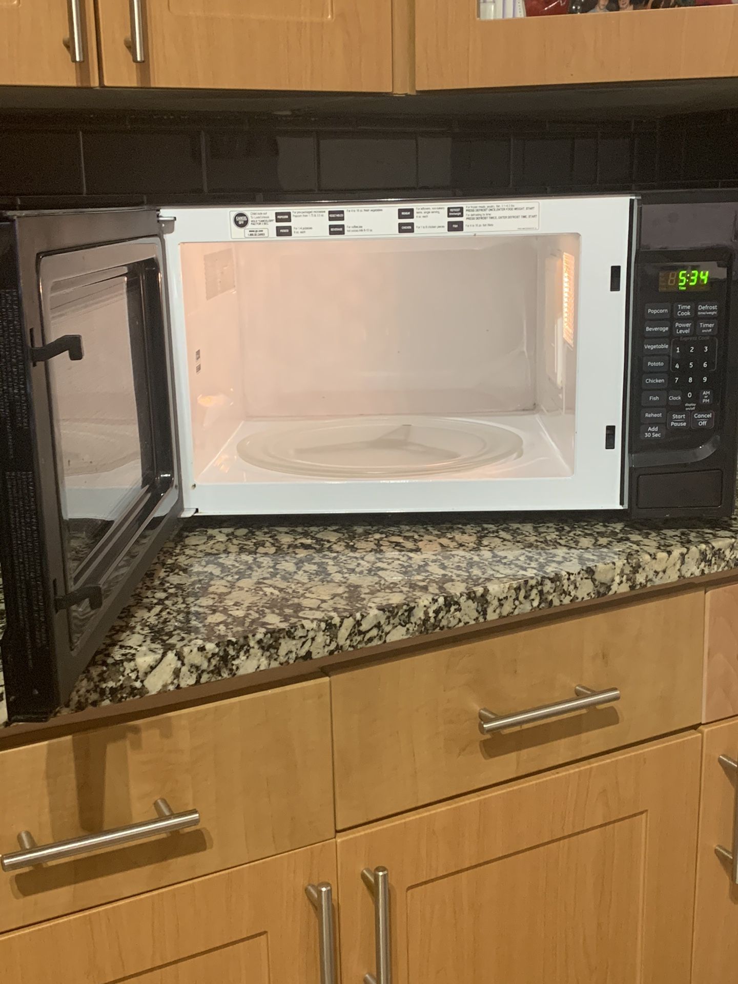 Black General Electric Countertop Microwave Oven