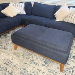 Jollene Fabric Sectional w/ Storage Ottoman