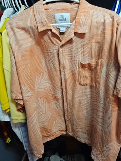Mens summer shit. The color is a salmon color difficult to see in picture.