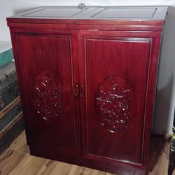 Bautiful mid-century modern carved ornate Chinese rosewood flip-top dry bar cabinet. 