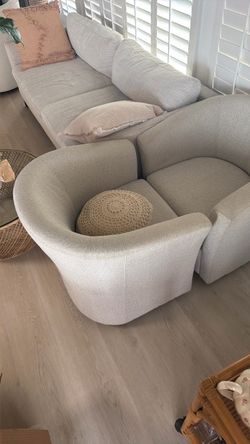 2 swiveling living room chairs