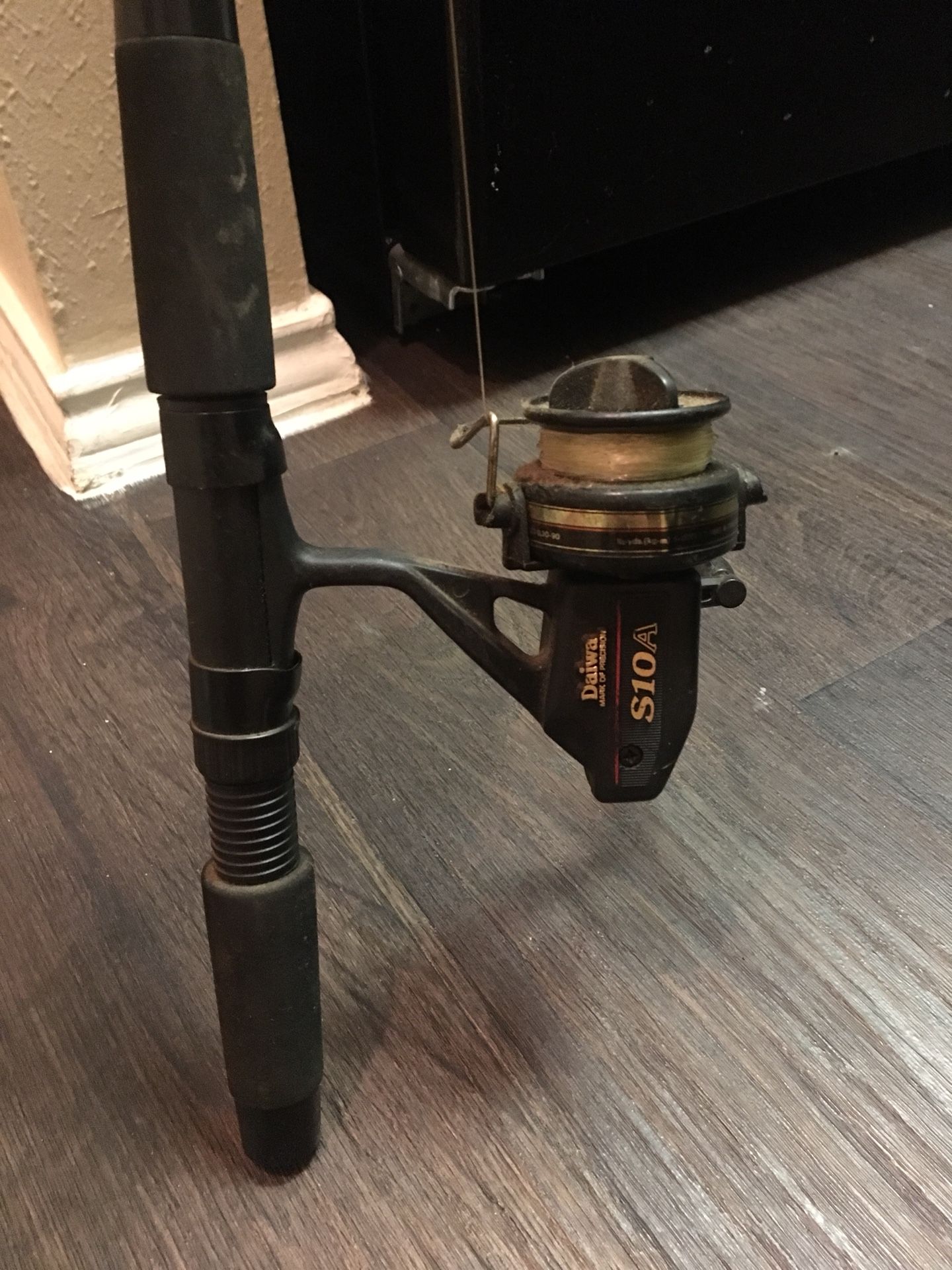 Daiwa mark of precision S10A on Daiwa 210-SPK fishing rod