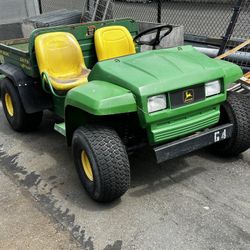 John Deere Gator And trailer