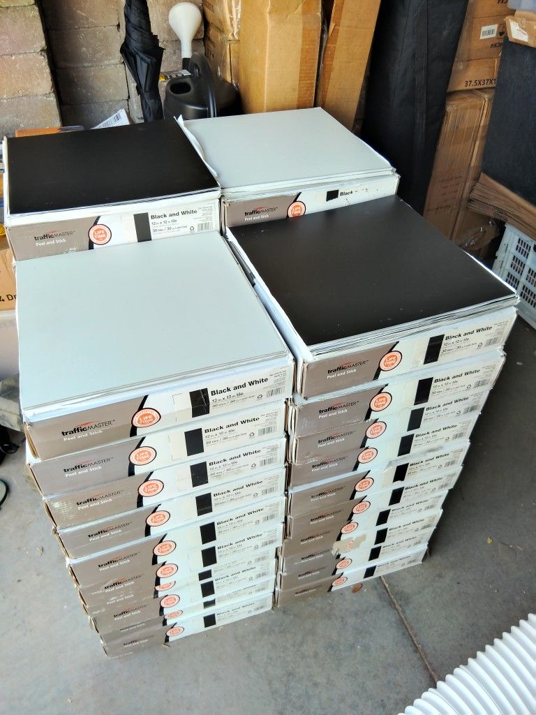 12-in X 12-in Black And White Color Tile Stick On. New In The Box. 42 Boxes. Brand Name TrafficMaster.