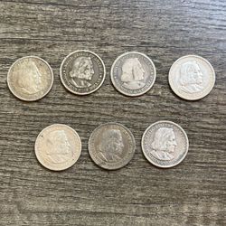 Lot of 7 Columbian Exposition Silver Half Dollars