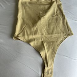 cream tube top bodysuit