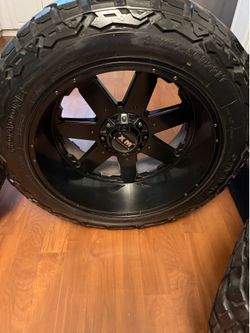 22x12 xtreme mudder rims n tires 35x12.50r22