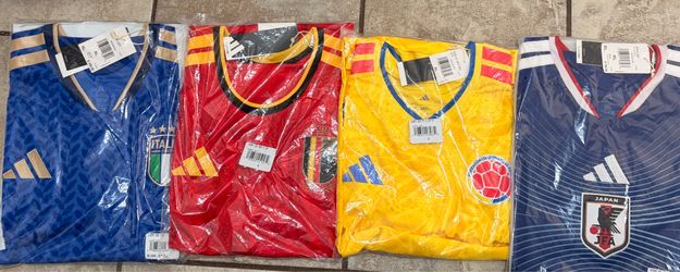 Italia, Belgian, and Japan jerseys