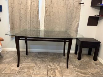 Glass table with wooden bottom and 4 chairs