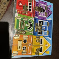 Melissa & Doug Latch board