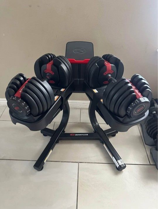 New Bowflex SelectTech 552 Adjustable Dumbbells (2x52.5Lbs).and Stand for $350 Firm (WALNUT 91789)
