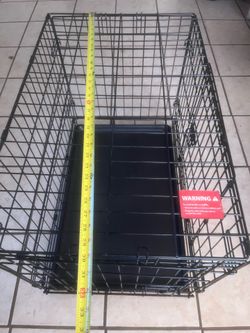 Double door dog cage 30 inches Long 21 inches higt 19 inches width