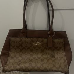 Brown Coach Signature handbag